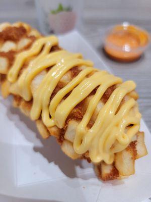 Potato dog with nacho cheese topping. Yummmm