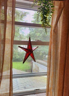 Red stained glass and metal hanging star only $9.99 if I remember correctly.