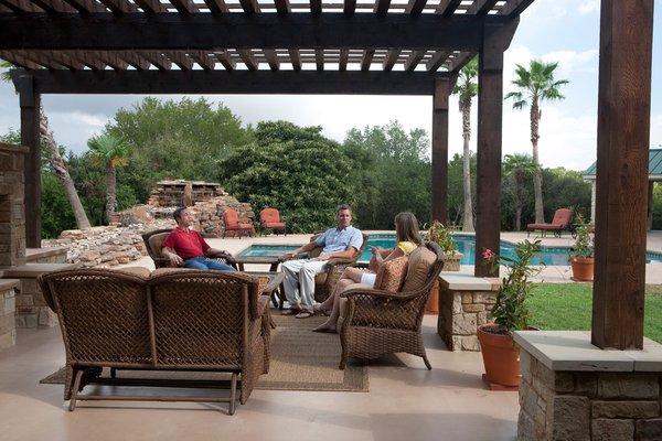 Small group therapy by one of the pools.