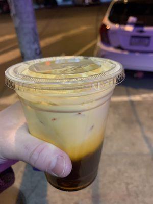 Some kind of delicious Thai Iced Tea. Mango? (compliments of the manager).