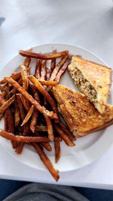 Boudin sandwich with a side fry. Not sure of the menu name