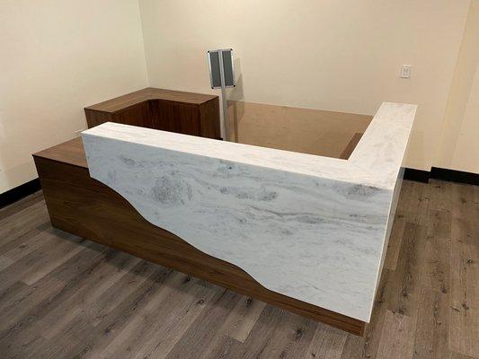 Walnut & Stone reception counter at Canyon Ridge Church