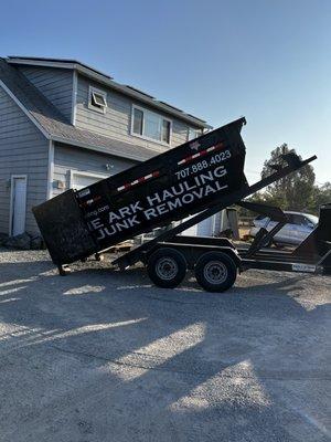 Dumpster Ben rolling off the trailer!