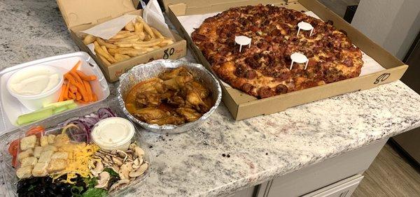 Salad, wings, pizza