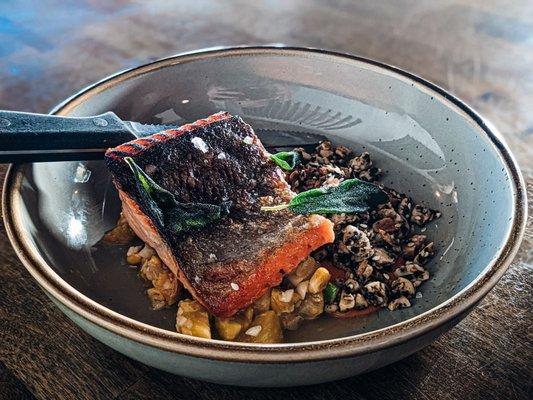 Steelhead trout. Heirloom succotash, marcona almond, furikake, romesco, sage.  (Fish is cooked to perfection with crispy skin outside)