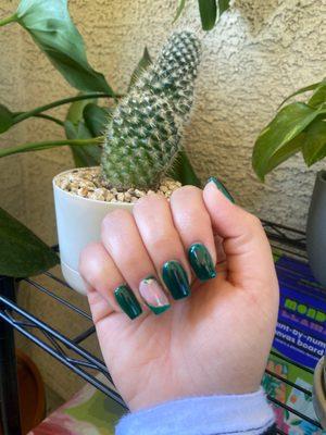 green nails (747) with simple ring finger design