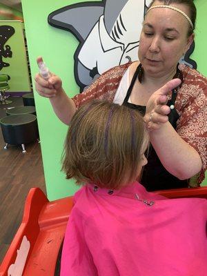 Amy put wash-out purple highlights and sparkles in my daughter's hair!