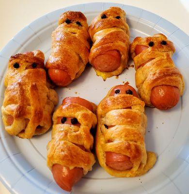 Mummy hotdogs made by kiddos