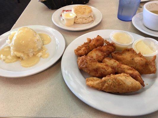 The famous chicken strips, with mashed potatoes and gravy and a buttermilk biscuit.