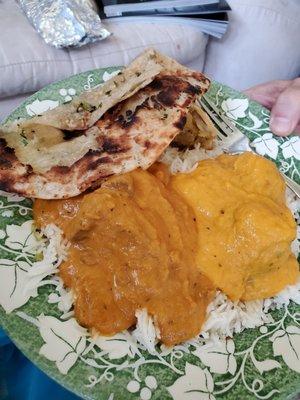 Garlic Naan, lamb korma and malai kofta with a half eaten samosa!