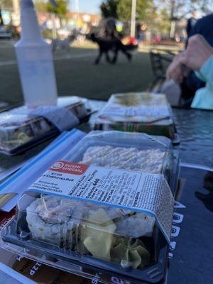 Grocery store sushi and drinks from our favorite dog park.  Live watching ours run and petting new dogs without having to take them home