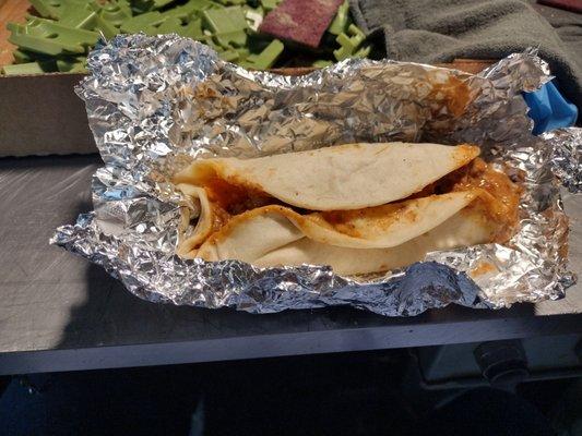 It's carne guisada taco with rice and beans I love there tacos