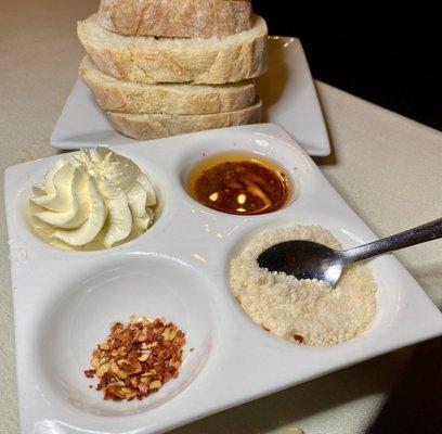 House made  bread with butter, spices, oil and cheese