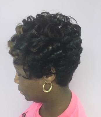 Would you like to grow your short hair cut out? No problem! Try applying fun curls to assist with your transition.