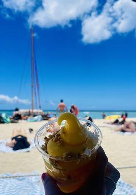 Pineapple Dole Whip with macadamia nuts and shredded coconut