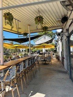 Outdoor covered patio with big huge fans - everything was so clean and hardly any street noise