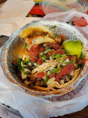 Steak, carnita and an el pastor taco trio complete with fresh Tortilla chip fast friendly and unexpectedly tasty  I'll be back!