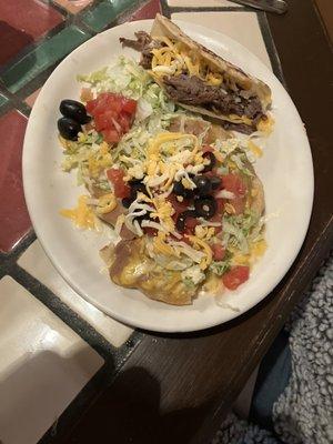 Shredded beef taco and green chili  tostada