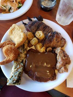 Medium rare steak, pot roast, salisbury steak, spinach and cheese bread stick, fried shrimp, fried fish, and fried okra