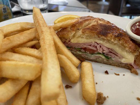 Ham and cheese croissant and fries!