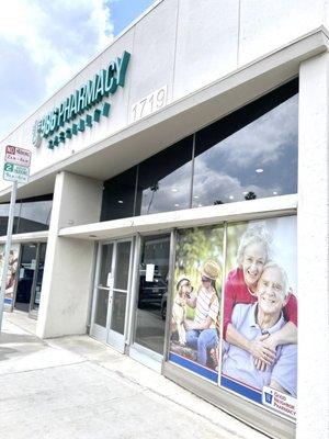 Front of the pharmacy. Parking lot entrance on the right side!