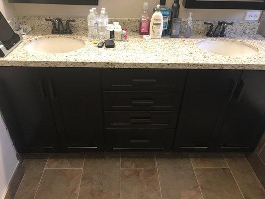 After remodel.  New vanity, sinks, and granite.