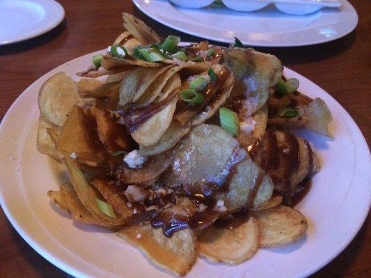 Homemade potato chips with blue cheese and balsamic