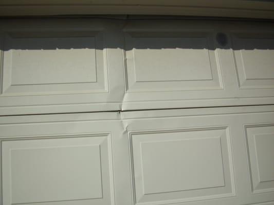 Cracked Garage Door Panel