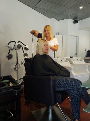 Christi cutting my daughter's hair--great job