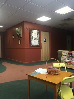 Other side of the lobby with a kids entertainment table while waiting in the waiting room