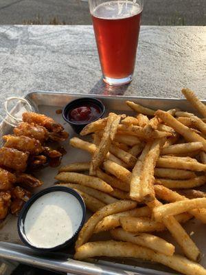 Shrimp appetizer, fries and cider