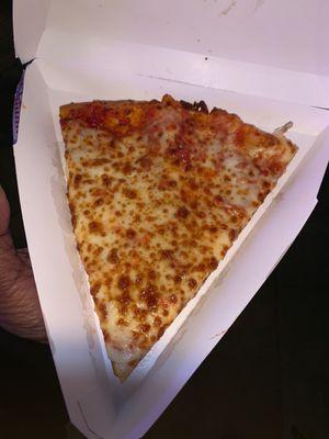 This slice of pizza was actually delicious!!! (7 out of 10)