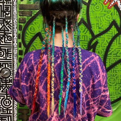 Partial dreadlock + synthetic rainbow extensions installation (after)