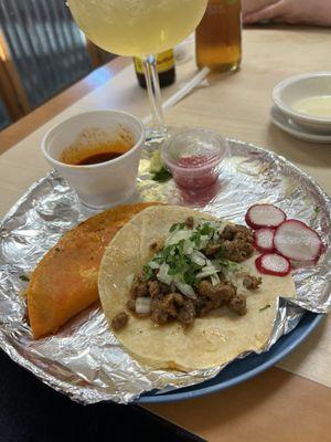 Carne Asada (R) and Birria (L) Tacos! Both delicious. Birria taco 10/5!