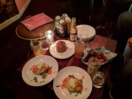 Clockwise from top left: Rice and Peas, Tamarind Wings, and Stuffed Crab Backs.