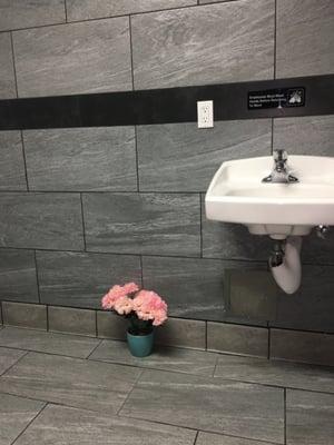 The bathrooms are so nice they even added flowers so clean