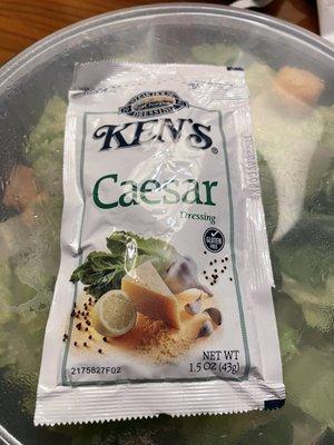 The front desk went back to the kitchen and returned with this packet of Ken's Caesar dressing.    Pathetic!