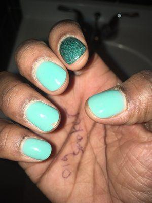 How she left my cuticles and where it chipped TWO days after service.