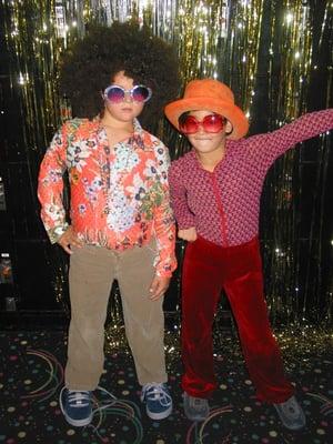 Disco Fever @ Roller Rink; Cadet is doing his Elton John impression - Before I fell and broke my ass