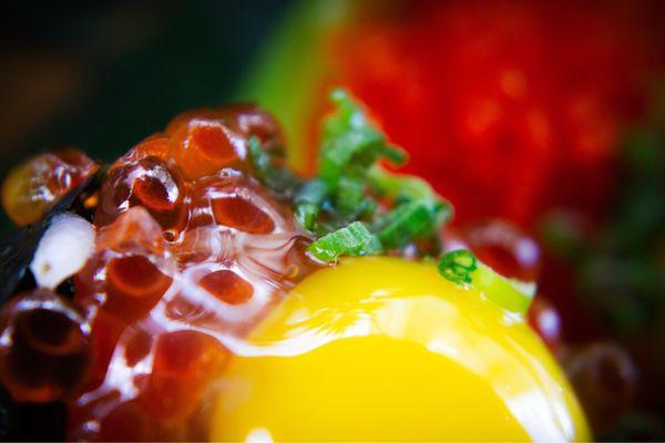 Salmon roe nigiri with quail egg.