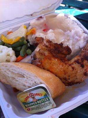 quarter chicken w/ a side of vegatables and garlic mashed potatoes + a slice of bread!