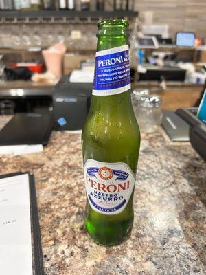 Peroni is a smooth Italian beer that pairs nicely with pizza!