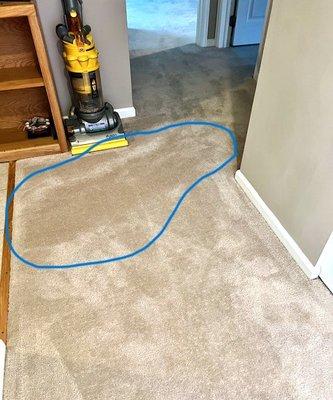 Hallway view. Carpet looks worn in less than a year. Newly vacuumed in this photo