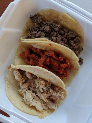 Three tacos ($2.75 each): carne asada, al pastor, and chicken.