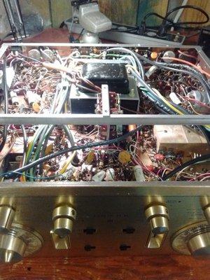 Inside of a 1960's Scott tube home hi-fi amplifier getting 'the once over'