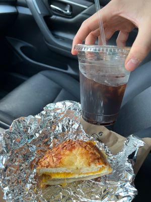 Cold brew and Asiago sausage egg and cheese