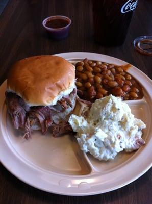 Pulled pork sandwich (pre-sauce), beans & potato salad