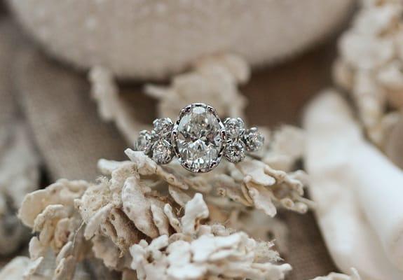 Custom Diamond Engagement ring featuring the artist, Caroline's signature crown style settings.