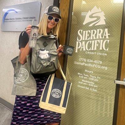 CEO Leslie Ramsdell shows off a... few... of Sierra's new brand merch!