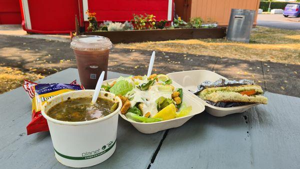 Blackberry cedar iced latte and lunch combo 3 with kale and portuguese sausage, caesar salad and grilled caprese